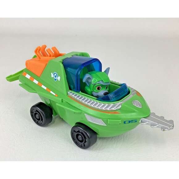 Spin Master Other - Paw Patrol Rescue Aqua Pups Rocky with Figure Transforming Sawfish Vehicle Toy